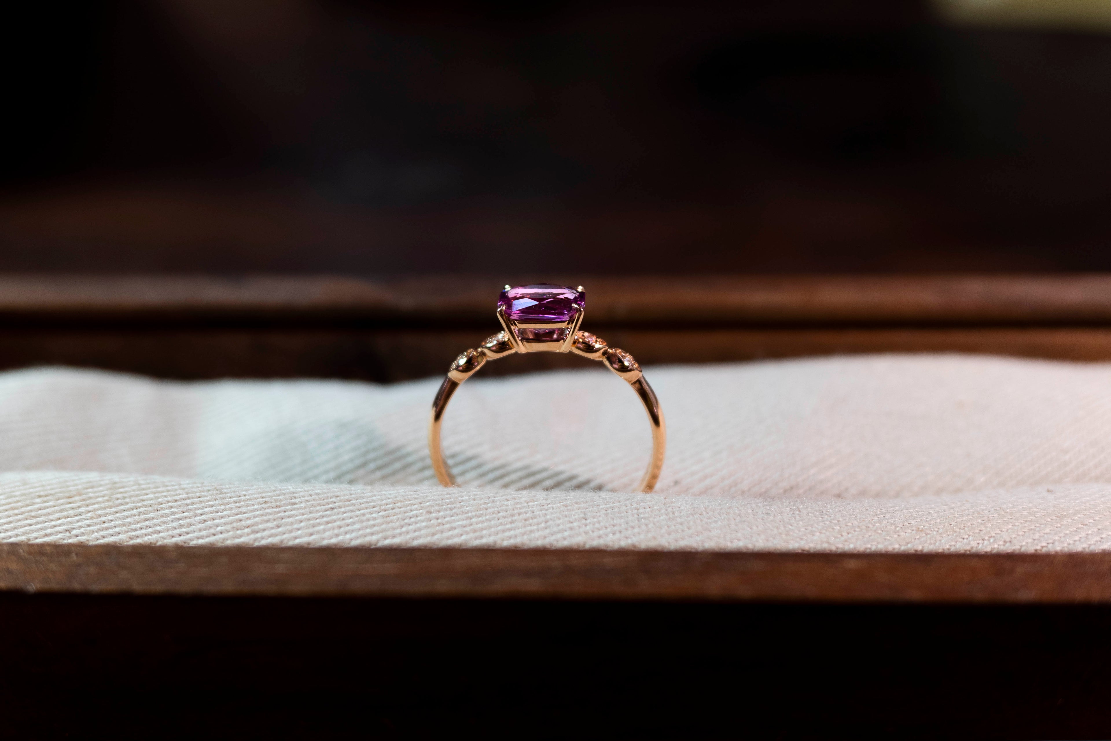 18K rose gold engagement ring with purple sapphire